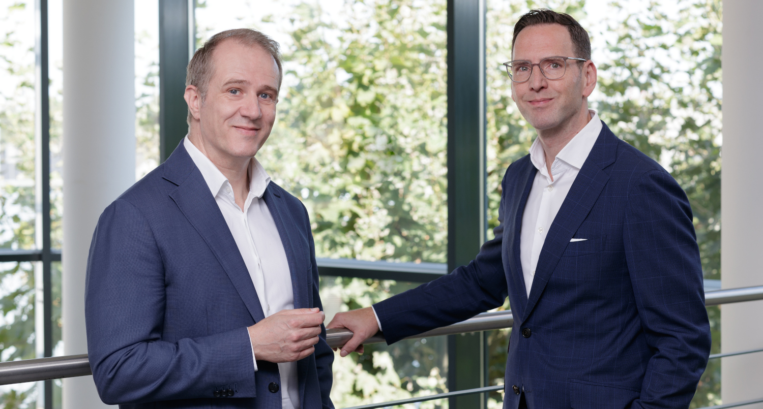 Partners of Charles Barker are sitting at the desk